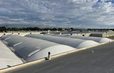 Full tear-off with 14” coverboard and 60 mil Carlisle TPO installed on 43000 sq ft roof Stockton Ca