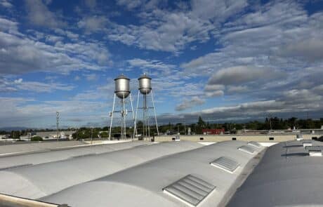 Full tear-off with 14” coverboard and 60 mil Carlisle TPO installed on 43000 sq ft roof Stockton Ca
