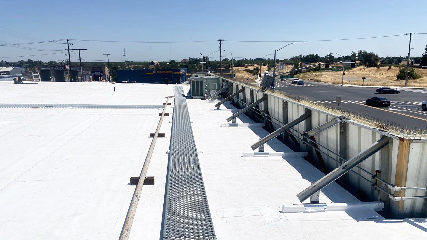 TPO-flute-fill-metal-retrofit-roofing-system-Carlisle-60-mil-roofing-company-in-modesto-Modesto-Califo TPO Flute Fill Metal Retrofit Roof Installation Modesto CA