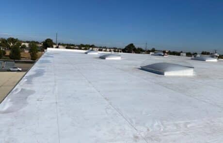 Commercial Roof Replacement, EPDM Full Tear-Off, 60 mil Carlisle Single-Ply TPO Roofing System, Skylight Fabrication and Installation, Stockton CA, Peterson Roofing, commercial roofing, flat roof replacement, EPDM roof removal, commercial skylight replacement, dry rot roof repair, insulation and cover board installation