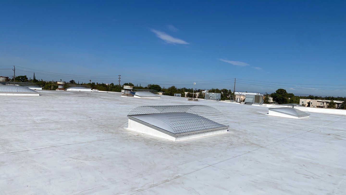 Commercial Roof Replacement, EPDM Full Tear-Off, 60 mil Carlisle Single-Ply TPO Roofing System, Skylight Fabrication and Installation, Stockton CA, Peterson Roofing, commercial roofing, flat roof replacement, EPDM roof removal, commercial skylight replacement, dry rot roof repair, insulation and cover board installation
