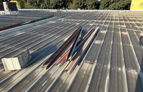 Commercial Roof Replacement, TPO Retrofit Roofing System, Modesto CA, Peterson Roofing, commercial roofing contractor, metal roof retrofit, TPO roofing membrane, flute fill insulation system, flat roof replacement, industrial roofing, roof overlay system, leak repair solution, Modesto commercial roofer