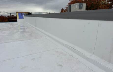 Commercial Roof Replacement, TPO Retrofit Roofing System, Modesto CA, Peterson Roofing, commercial roofing contractor, metal roof retrofit, TPO roofing membrane, flute fill insulation system, flat roof replacement, industrial roofing, roof overlay system, leak repair solution, Modesto commercial roofer