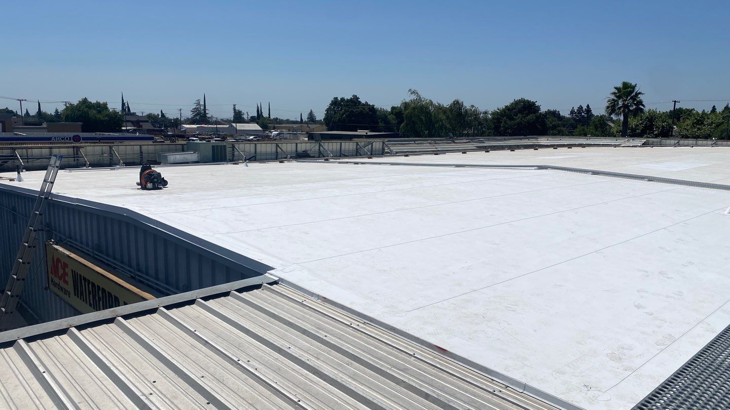 Flute fill TPO retrofit 17000 sq ft Waterford CA Peterson Roofing