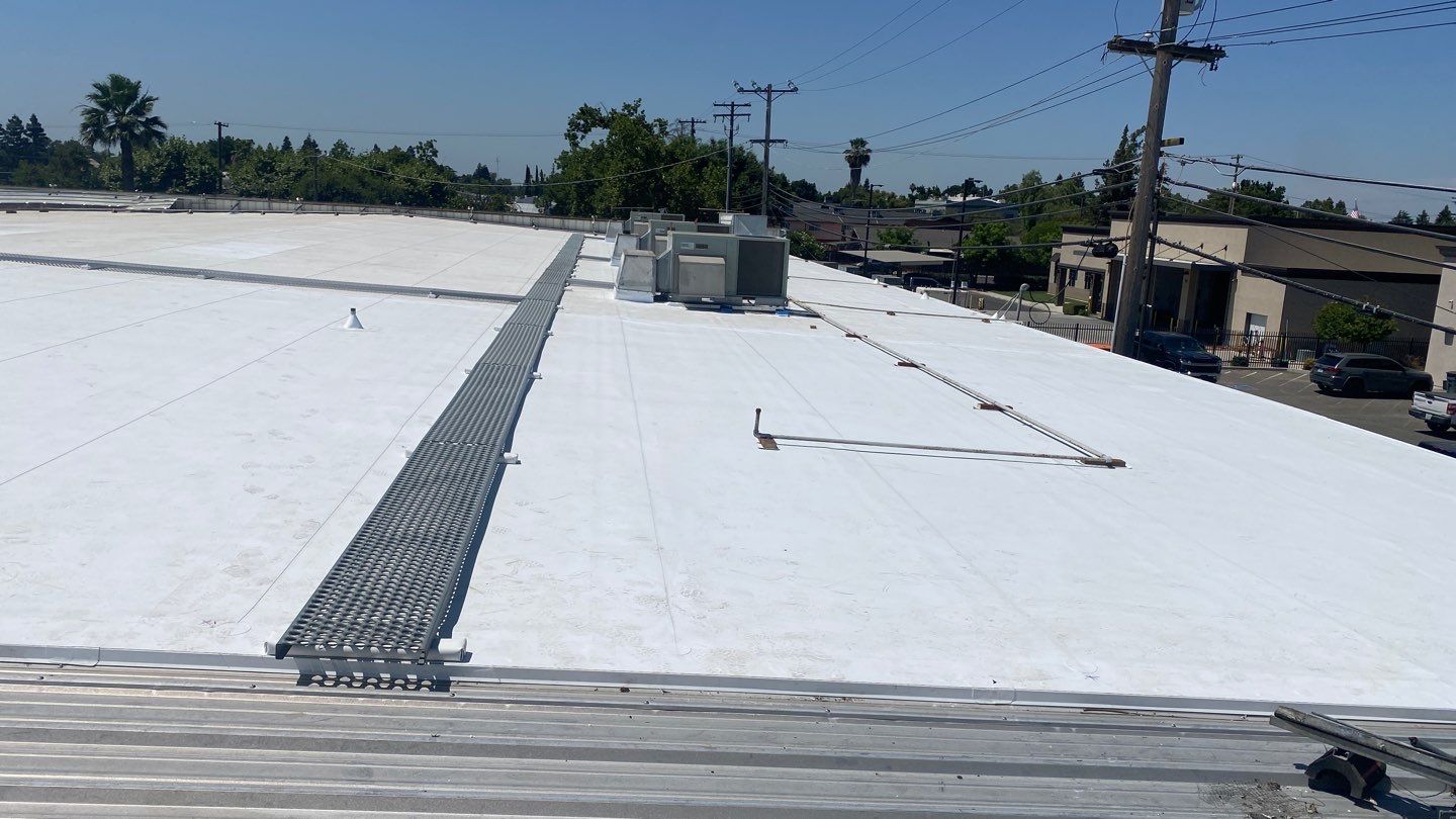 Flute fill TPO retrofit 17000 sq ft Waterford CA Peterson Roofing