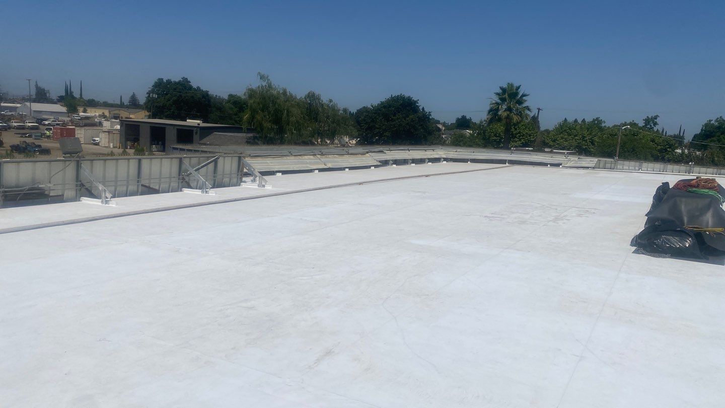 Flute fill TPO retrofit 17000 sq ft Waterford CA Peterson Roofing