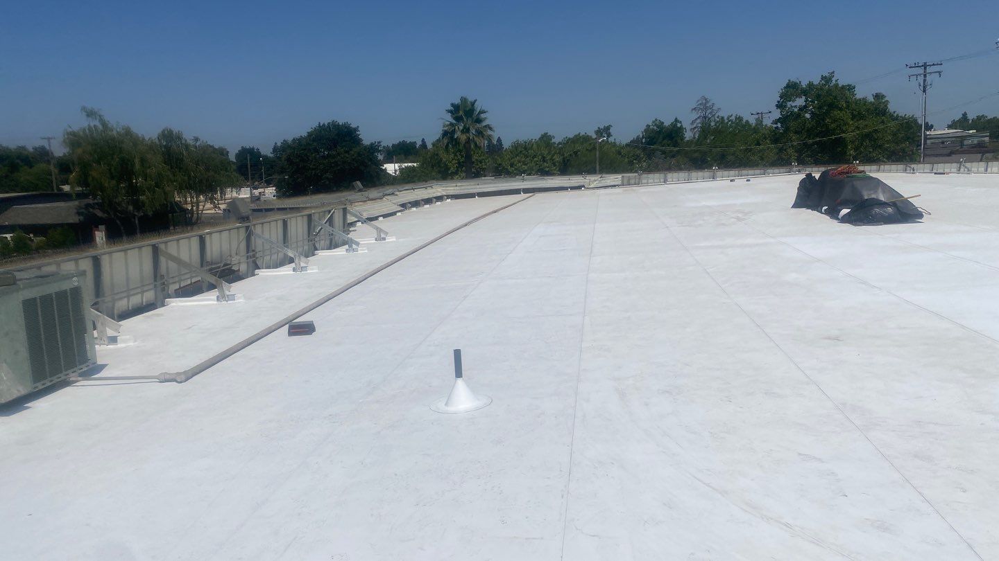 Flute fill TPO retrofit 17000 sq ft Waterford CA Peterson Roofing
