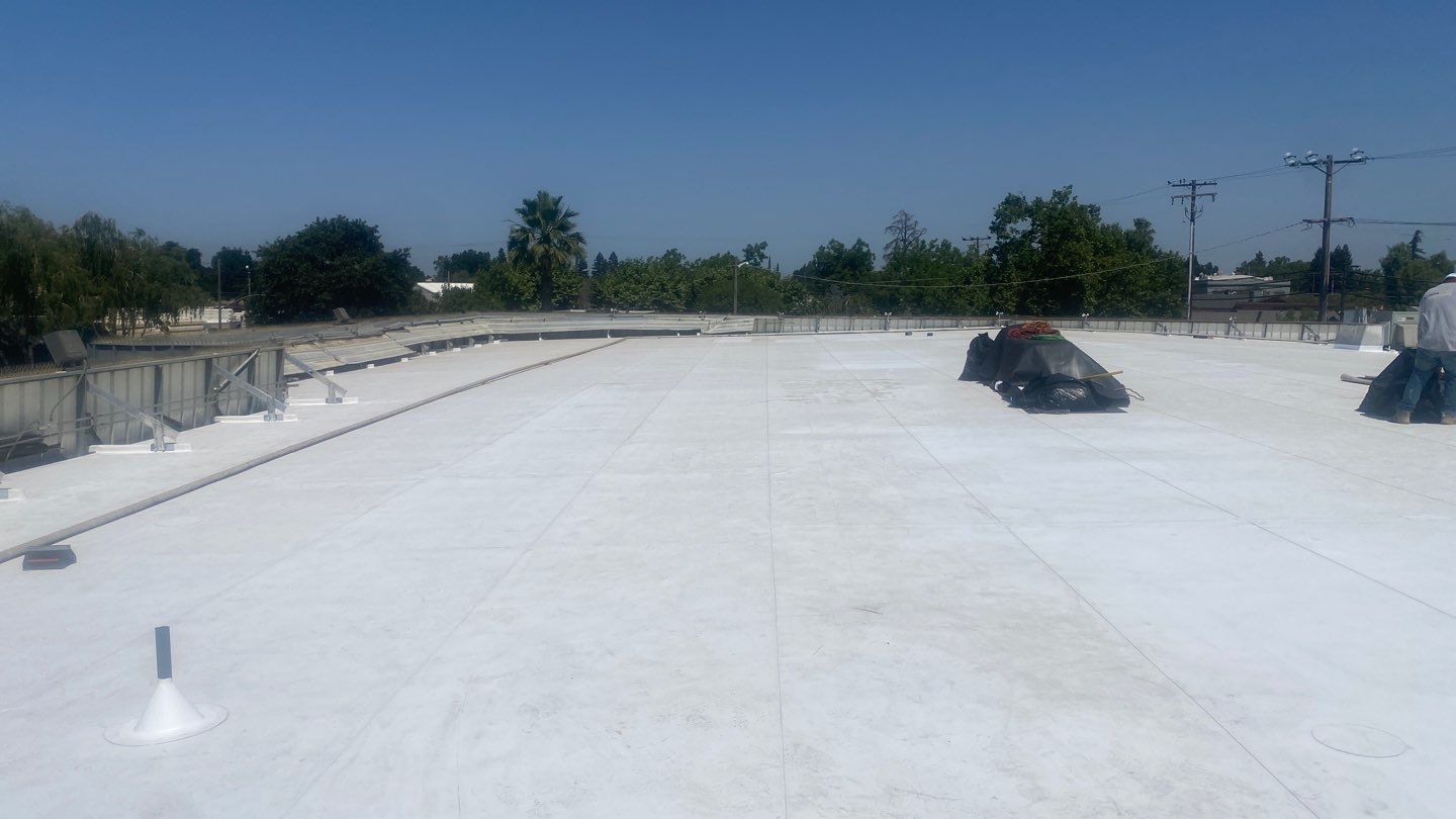 Flute fill TPO retrofit 17000 sq ft Waterford CA Peterson Roofing
