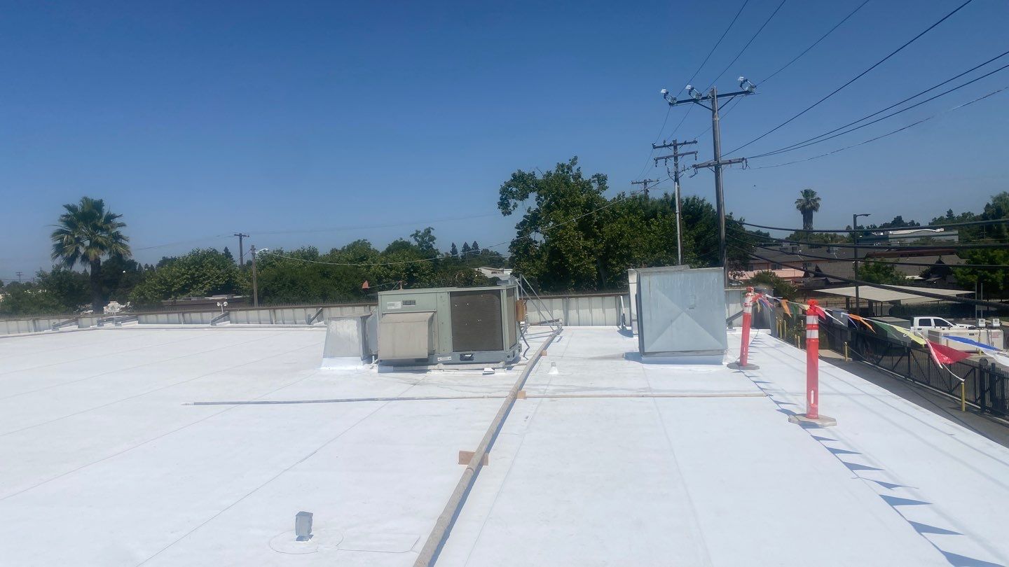 Flute fill TPO retrofit 17000 sq ft Waterford CA Peterson Roofing