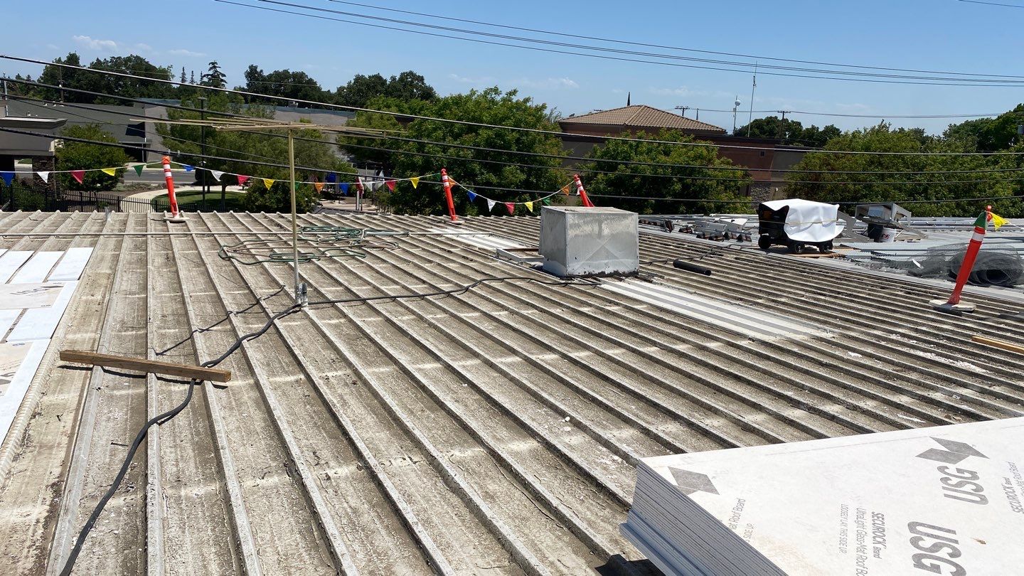 Flute fill TPO retrofit 17000 sq ft Waterford CA Peterson Roofing