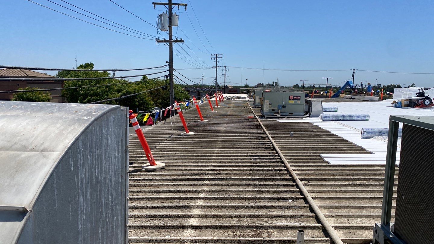 Flute fill TPO retrofit 17000 sq ft Waterford CA Peterson Roofing