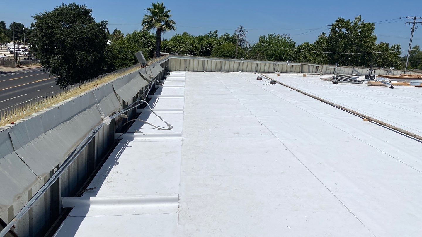 Flute fill TPO retrofit 17000 sq ft Waterford CA Peterson Roofing