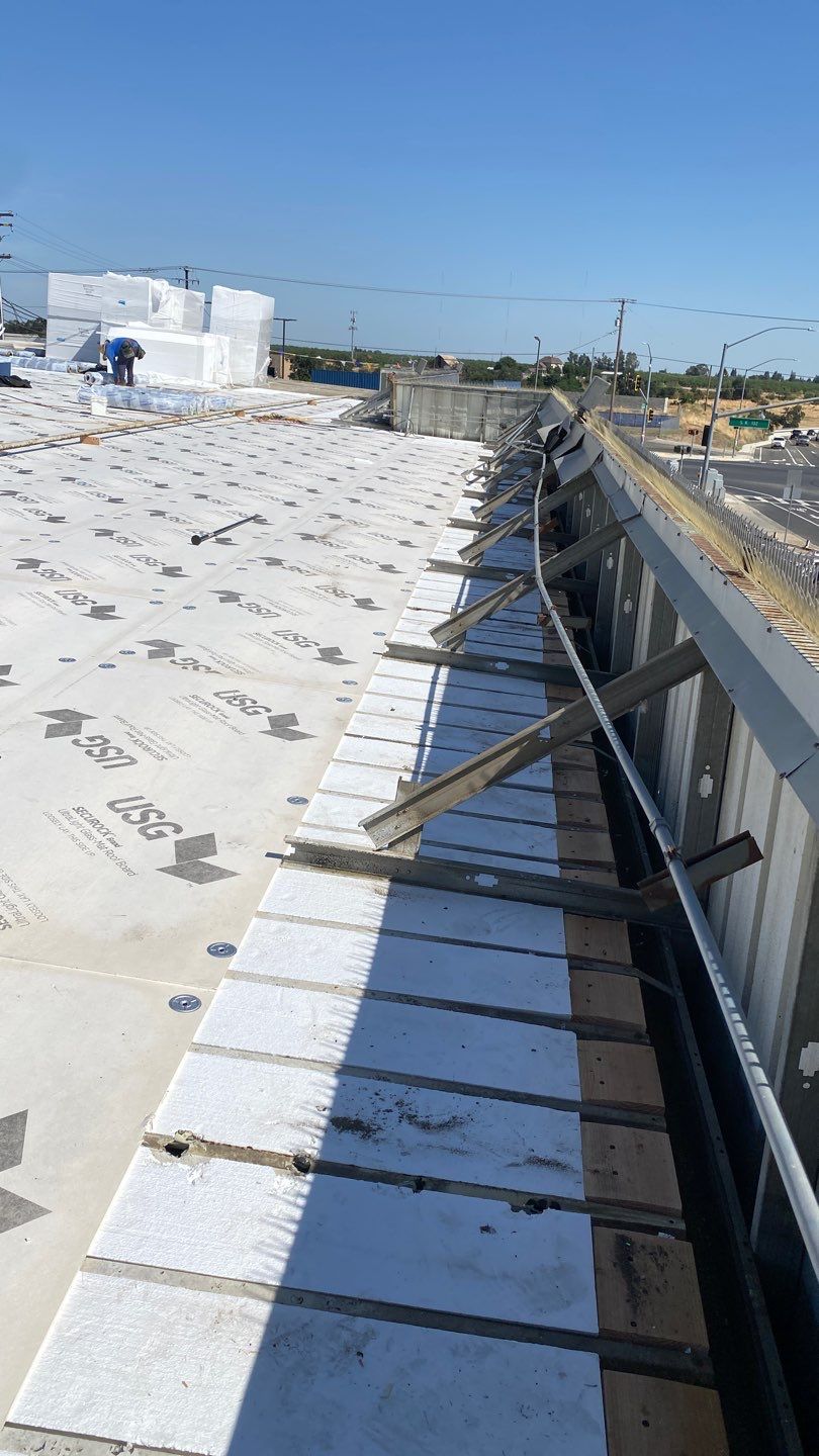 Flute fill TPO retrofit 17000 sq ft Waterford CA Peterson Roofing