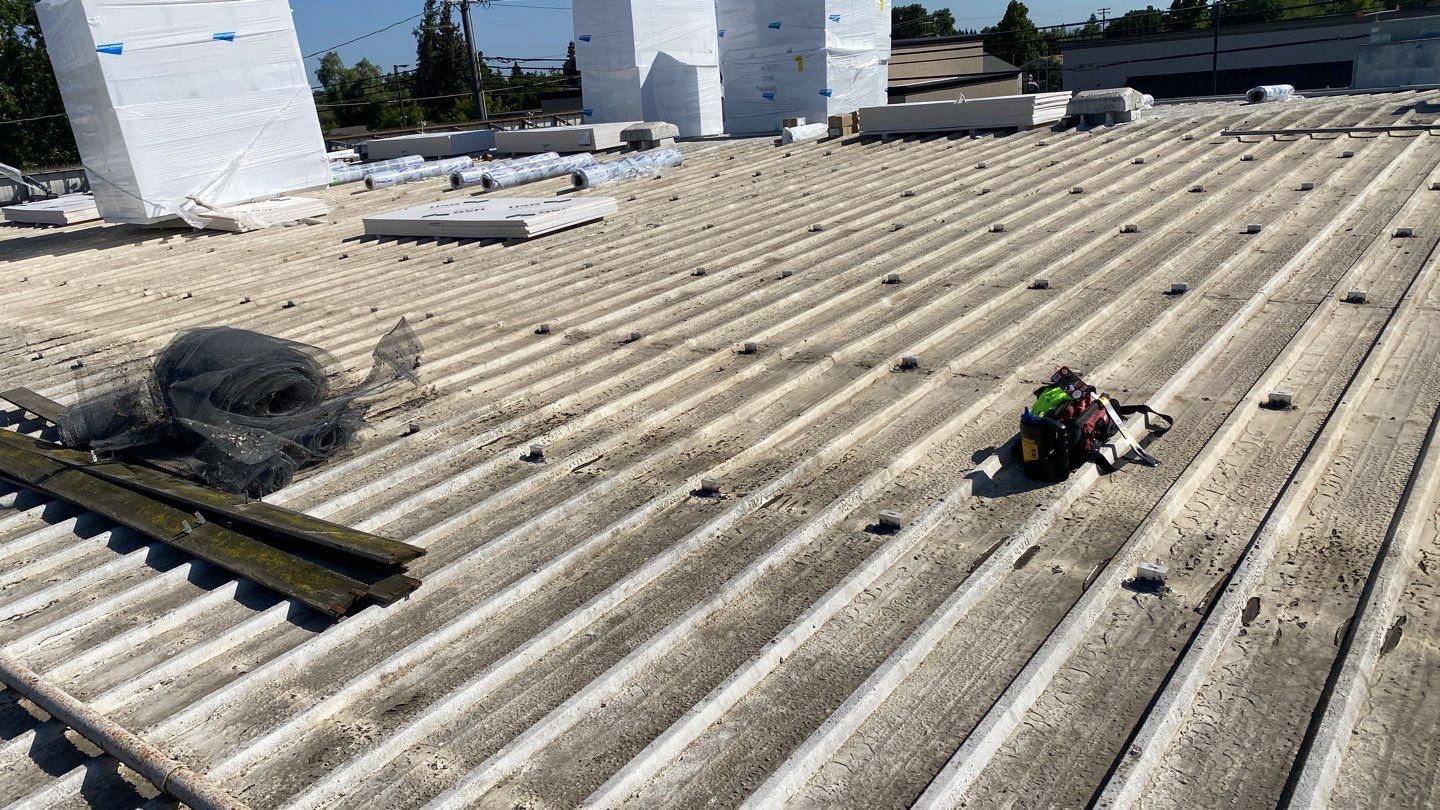 Flute fill TPO retrofit 17000 sq ft Waterford CA Peterson Roofing
