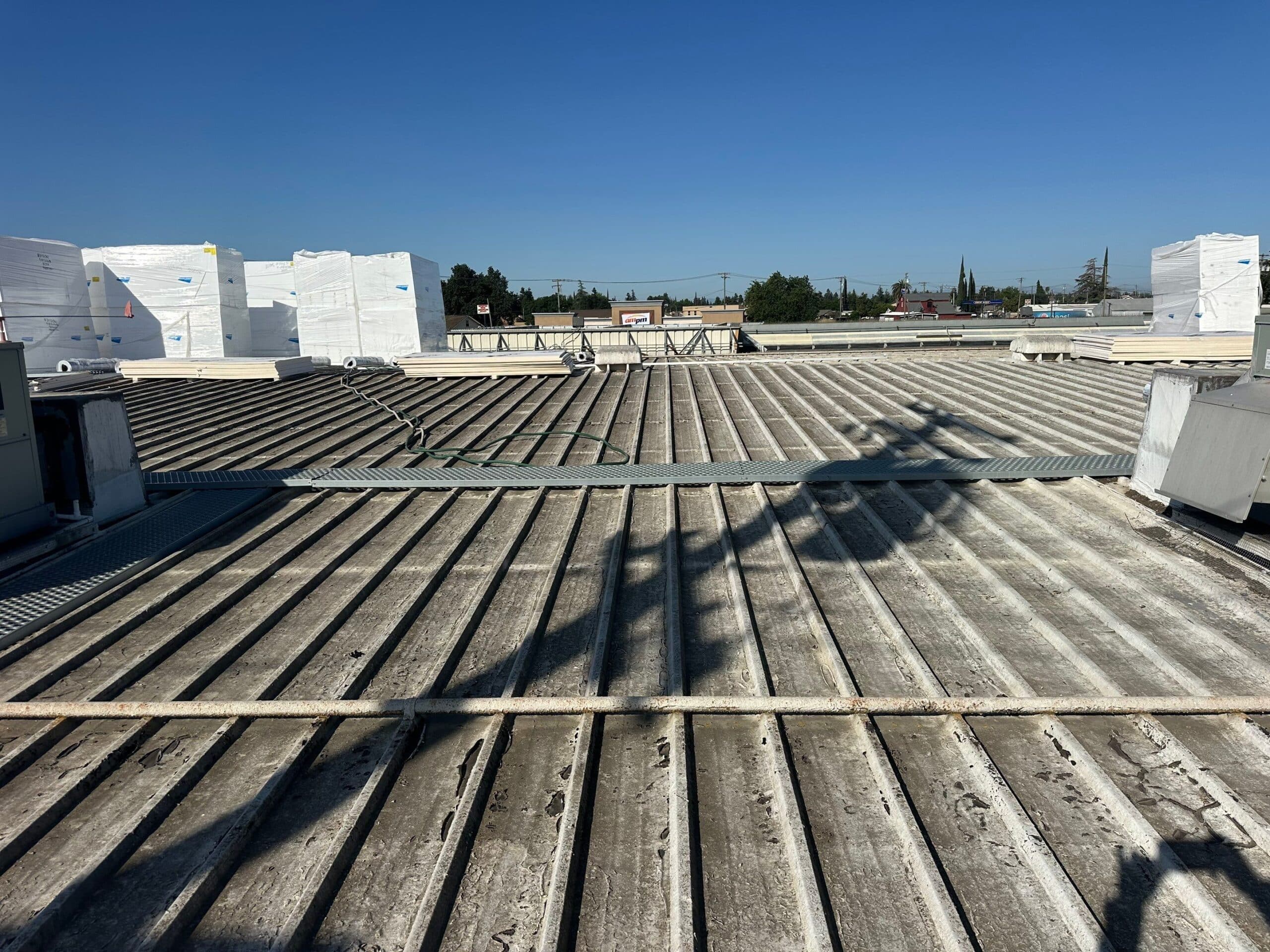 Flute fill TPO retrofit 17000 sq ft Waterford CA Peterson Roofing