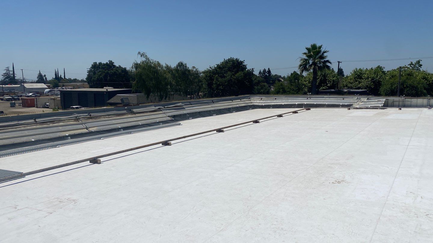 Flute fill TPO retrofit 17000 sq ft Waterford CA Peterson Roofing