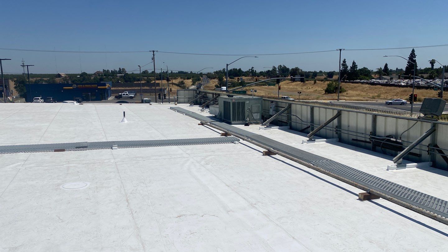 Flute fill TPO retrofit 17000 sq ft Waterford CA Peterson Roofing