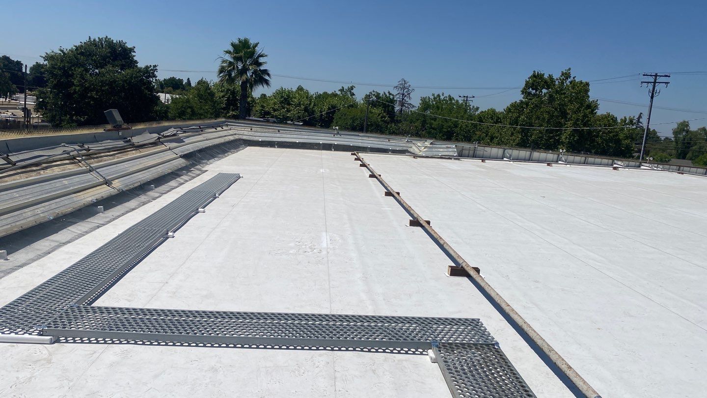 Flute fill TPO retrofit 17000 sq ft Waterford CA Peterson Roofing