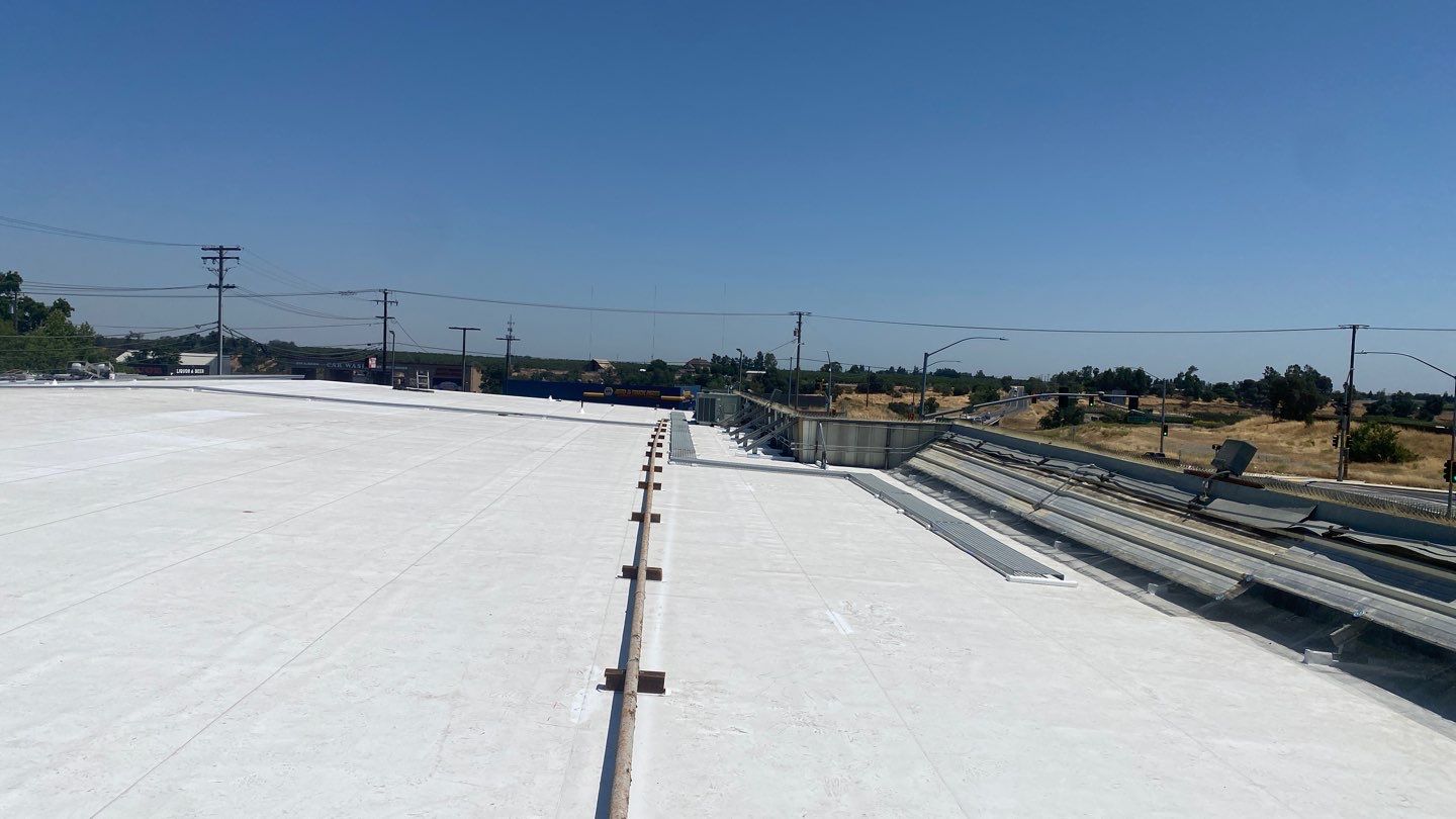 Flute fill TPO retrofit 17000 sq ft Waterford CA Peterson Roofing