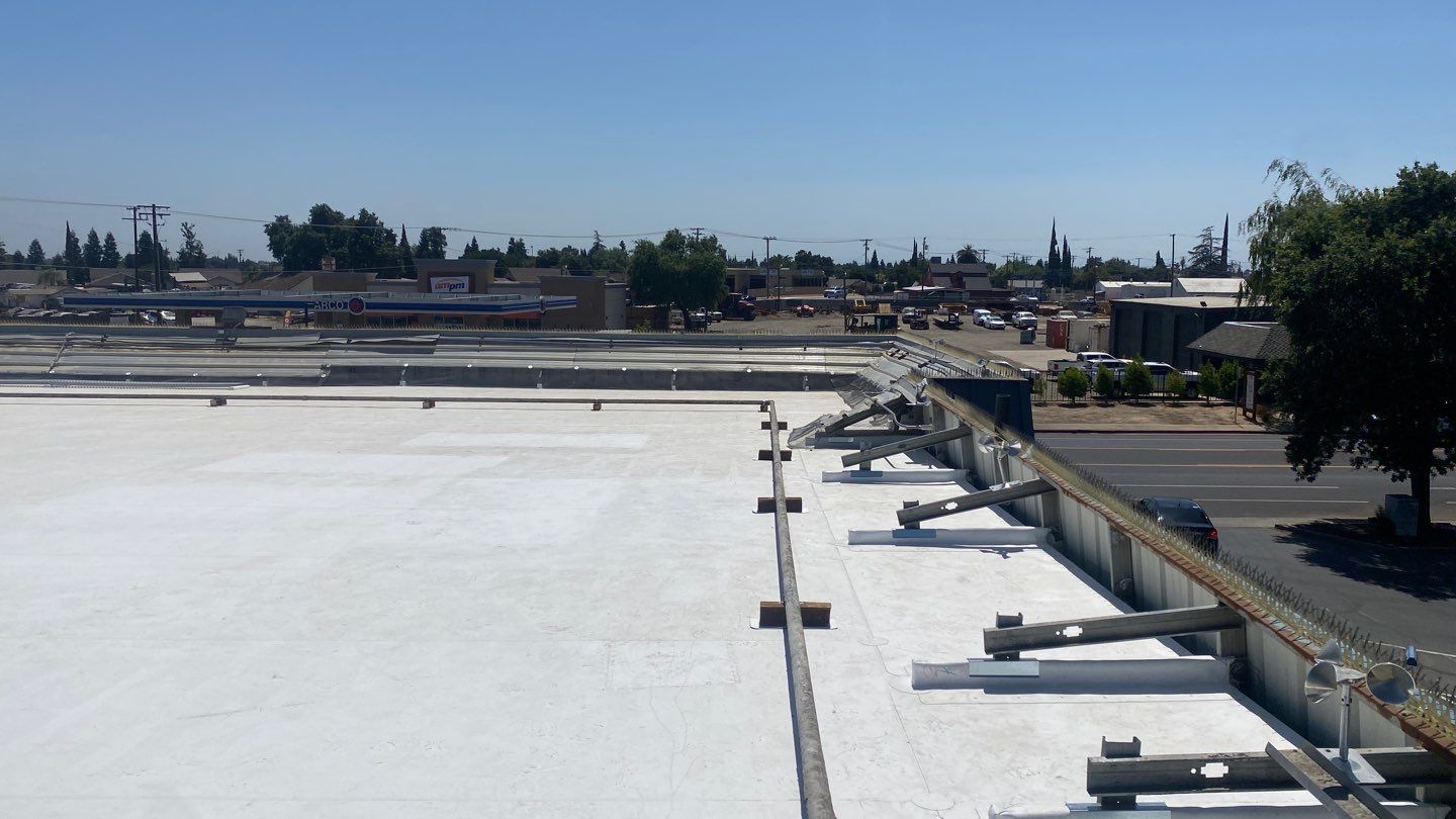 Flute fill TPO retrofit 17000 sq ft Waterford CA Peterson Roofing