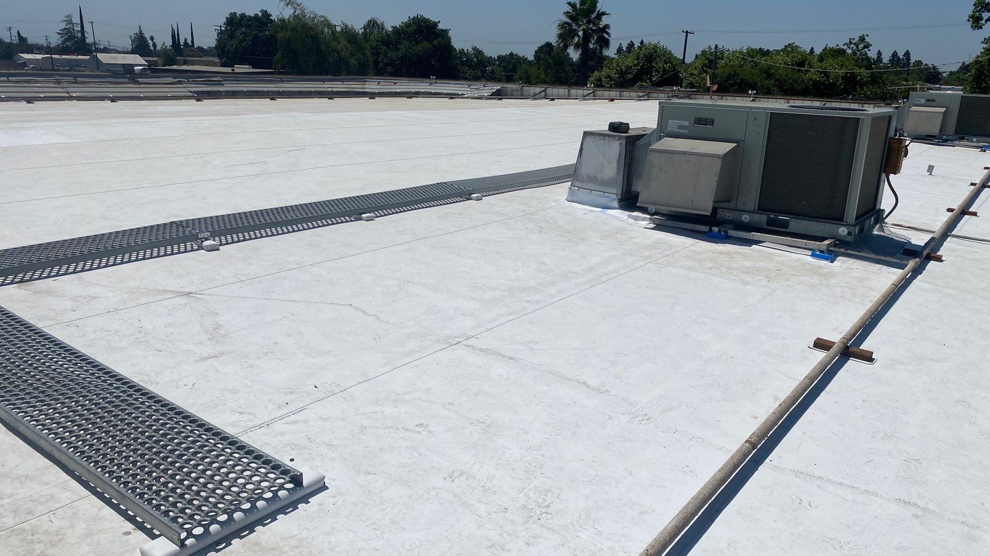 Flute fill TPO retrofit 17000 sq ft Waterford CA Peterson Roofing