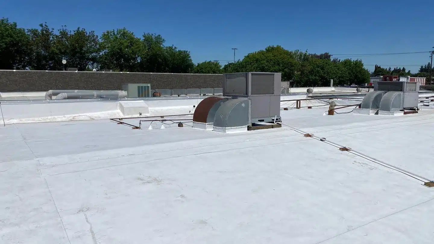 Commercial TPO roof replacement in Modesto CA by Peterson Roofing providing durable energy-efficient membrane roofing installation for long-lasting protection of commercial buildings